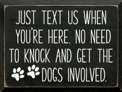 Sign: Just text us when you're here. No need to knock...